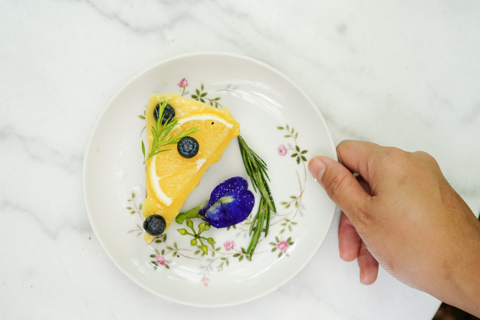 Plated dessert with edible flowers